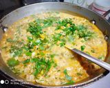 A picture of step 3 of Maggi with lots of veggies.