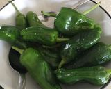 A picture of step 2 of Charred Padron Chilli Peppers.