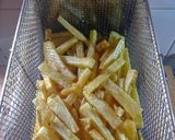 Foto del paso 2 de la receta: Papas fritas triple cocción con cheddar y panceta
