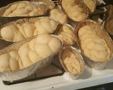 A picture of step 8 of Challah/bread loaves.