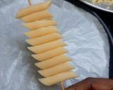 A picture of step 1 of Penne pasta pizza sticks.