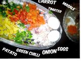 A picture of step 1 of Memon's fusion omelet.