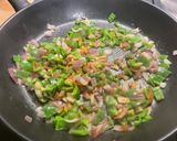 A picture of step 9 of Scrambled Eggs with Green Peppers, Red Onion, and Coulommiers Cheese.