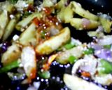 A picture of step 2 of Chilli garlic potatoes.