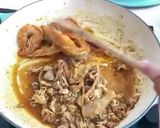 A picture of step 1 of Seafood Rosmarino Paella.