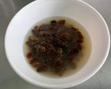 Une image de l'étape 2 de Taboulé aux tomates, légumes, raisins, herbes et épices.