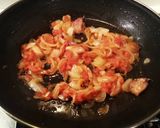 Foto del paso 4 de la receta: Pollo guisado al cardamomo y cilantro