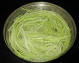 A picture of step 1 of Lauki sweet-Hariyala lachha (bottlegourd sweet).