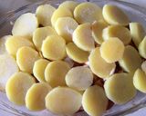 Rakott burgonya gazdagon recept fázis 3 fotója