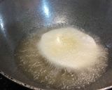 A picture of step 13 of Dal puri.