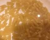 A picture of step 1 of Macaroni with garlic butter and veg.