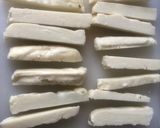 A picture of step 1 of Baked halloumi fries.
