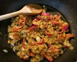 A picture of step 1 of Cape Malay Chicken Curry with Yellow Rice.