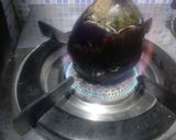 A picture of step 1 of Baingan bharta.