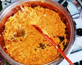 A picture of step 3 of Jollof rice with sauced chicken 😋😋.