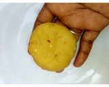 A picture of step 9 of Yam Donuts.