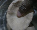 A picture of step 3 of Litti choka with coriander chutney.