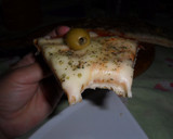 Foto del paso 16 de la receta: Pizza de muzzarella y aceitunas