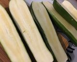 Une image de l'étape 2 de Courgettes farcies carotte jambon emmental.