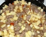 Foto del paso 5 de la receta: Revuelto con papá morrón cebolla y huevo