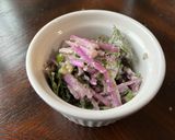 A picture of step 4 of Mizuna salad with tofu Caesar dressing.