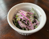 A picture of step 4 of Mizuna salad with tofu Caesar dressing.