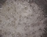 A picture of step 3 of Delicious soan papdi.