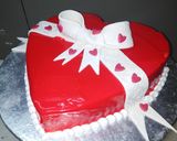 A picture of step 6 of Blood red heart shape cake.