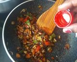A picture of step 13 of Schezwan Fried Rice.