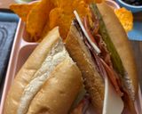 A picture of step 3 of Subway at home/ sub board.