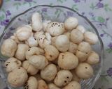 A picture of step 1 of Makhana revdl sesame seeds coated (til).