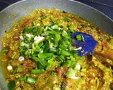 A picture of step 8 of Baingan bharta with spring onion.