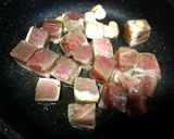 Foto del paso 5 de la receta Dados de atún congelado al ajillo con puré de alubia blanca