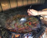 A picture of step 11 of Paella with Vegetables and Meat.