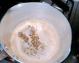 A picture of step 2 of Karak doodh pati.