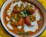 A picture of step 8 of Stuffed Tomatoes in gravy.