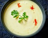 A picture of step 6 of Kachchi Haldi Paratha with Sarson ka Raita.