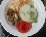 A picture of step 10 of Steamed vegetable rice, fried beef stew n steamed cabbages.
