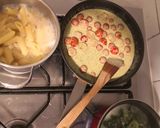A picture of step 3 of Pasta à la pesto, (chicken/ mushrooms, broccoli) & tomatoes.