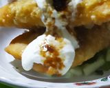 A picture of step 8 of Dahi Lukhmi.