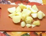 A picture of step 1 of Dahi Aloo.