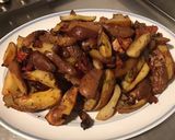 Une image de l'étape 12 de Pommes de terre au lard, poivrons et tomates.