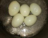 A picture of step 2 of Egg potatoes gravy.