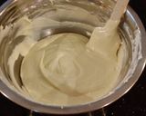 A picture of step 10 of Individual Vanilla Cheesecakes with Chocolate Ganach Topping.