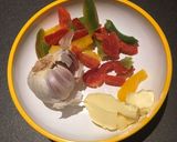 A picture of step 2 of Macaroni with garlic butter and veg.