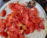 A picture of step 1 of Tomato Garlic Pickle.