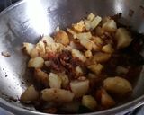 A picture of step 1 of Potato egg curry.