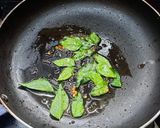 A picture of step 11 of Pavakkai /bitter gourd pitlai.