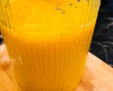 A picture of step 2 of Turmeric orange juice.