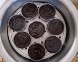 A picture of step 3 of Chocolate idly cake in a pan.